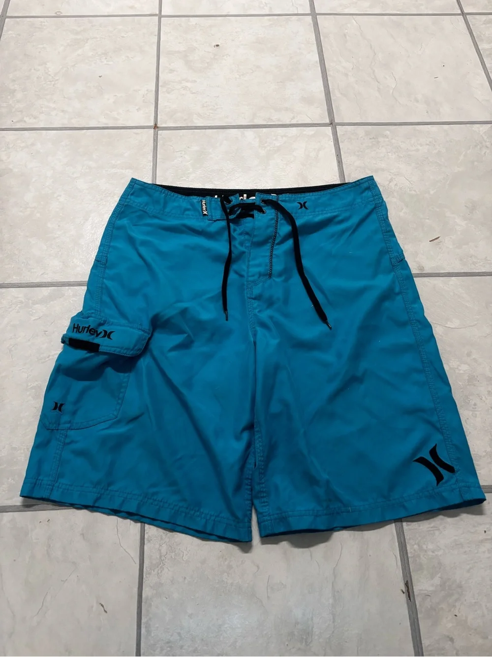 Vintage Hurley Men’s Teal Board Shorts with Black Accents size 32 MEASURE SHOWN